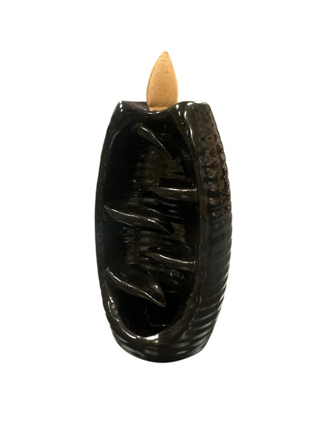Black incense burner with a wooden wick on a white background