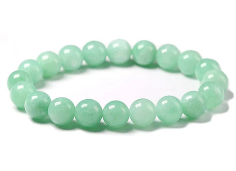 Green beaded Jade bracelet on a white background