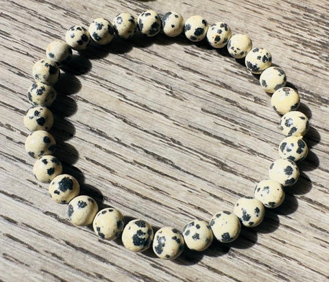 Bracelet made of beads on a wooden surface