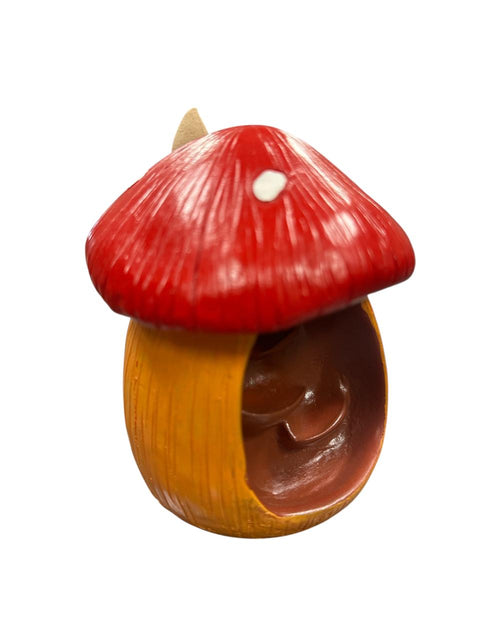 Mushroom-shaped bird feeder with a red cap and brown body on a white background